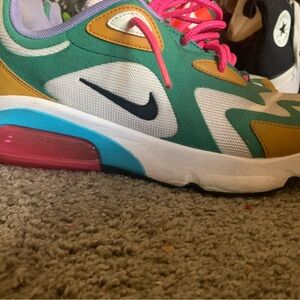 Nike womans Sneakers in Green, Pink, and Gold